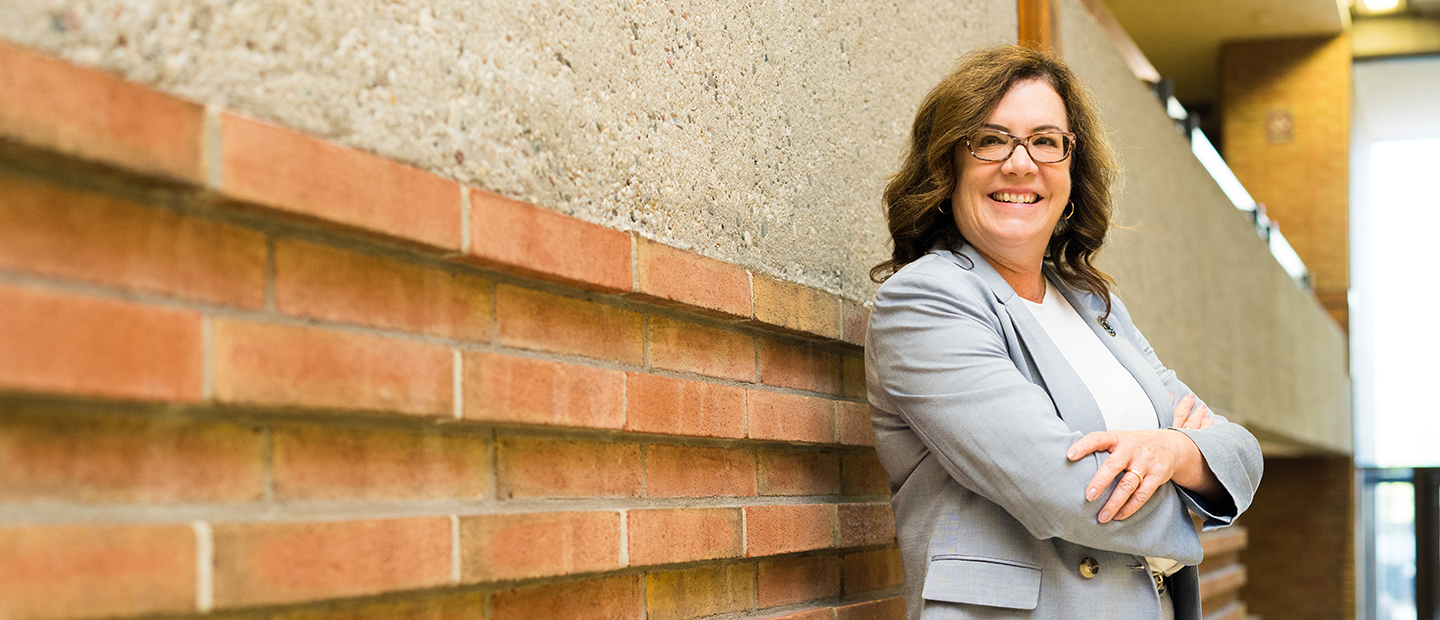 Dean Elaine Carey image of CAS Dean Elaine Carey standing in Varner Hall