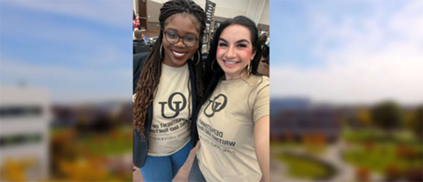 Two female students posing