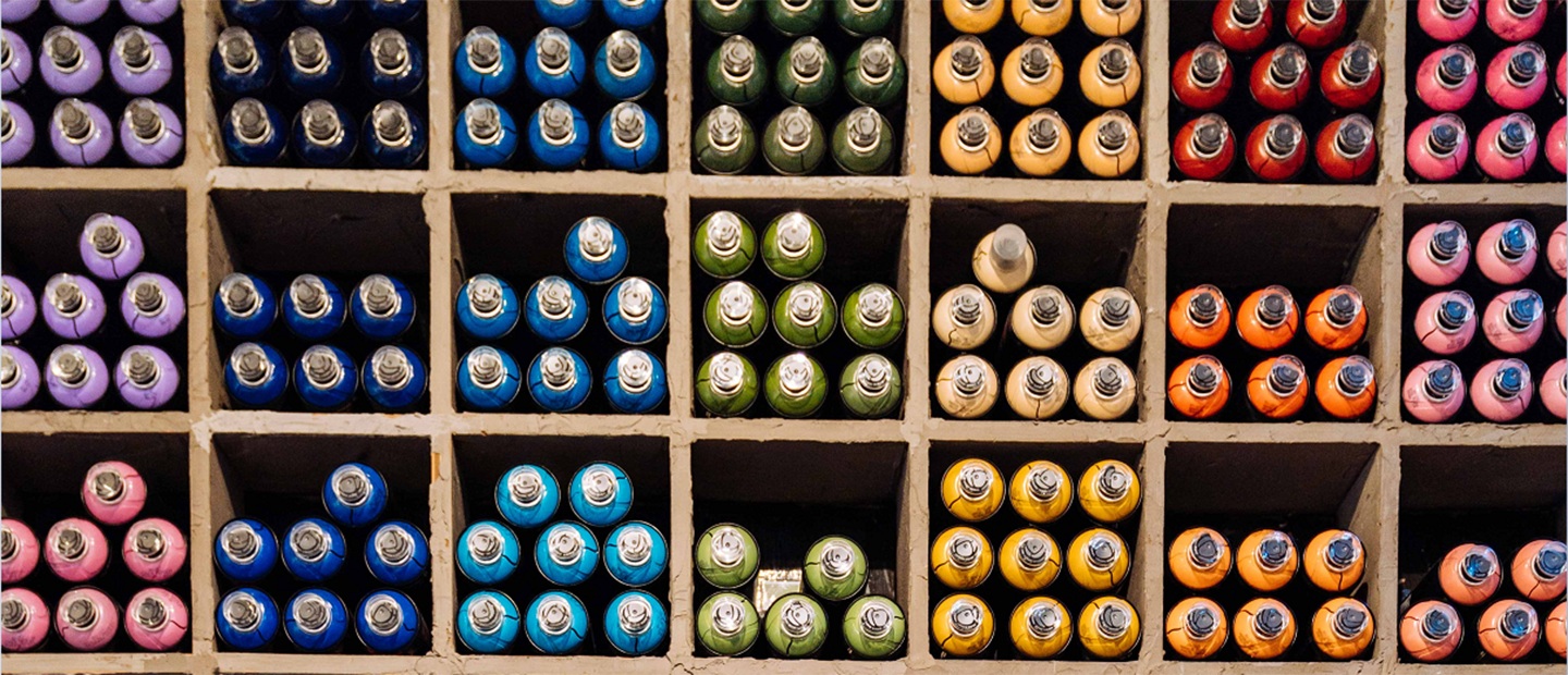 Art supply tubes organized by color  