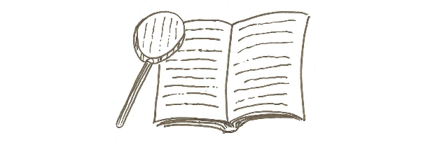 Reading book magnifying glass Magnifying glass in front of an open book