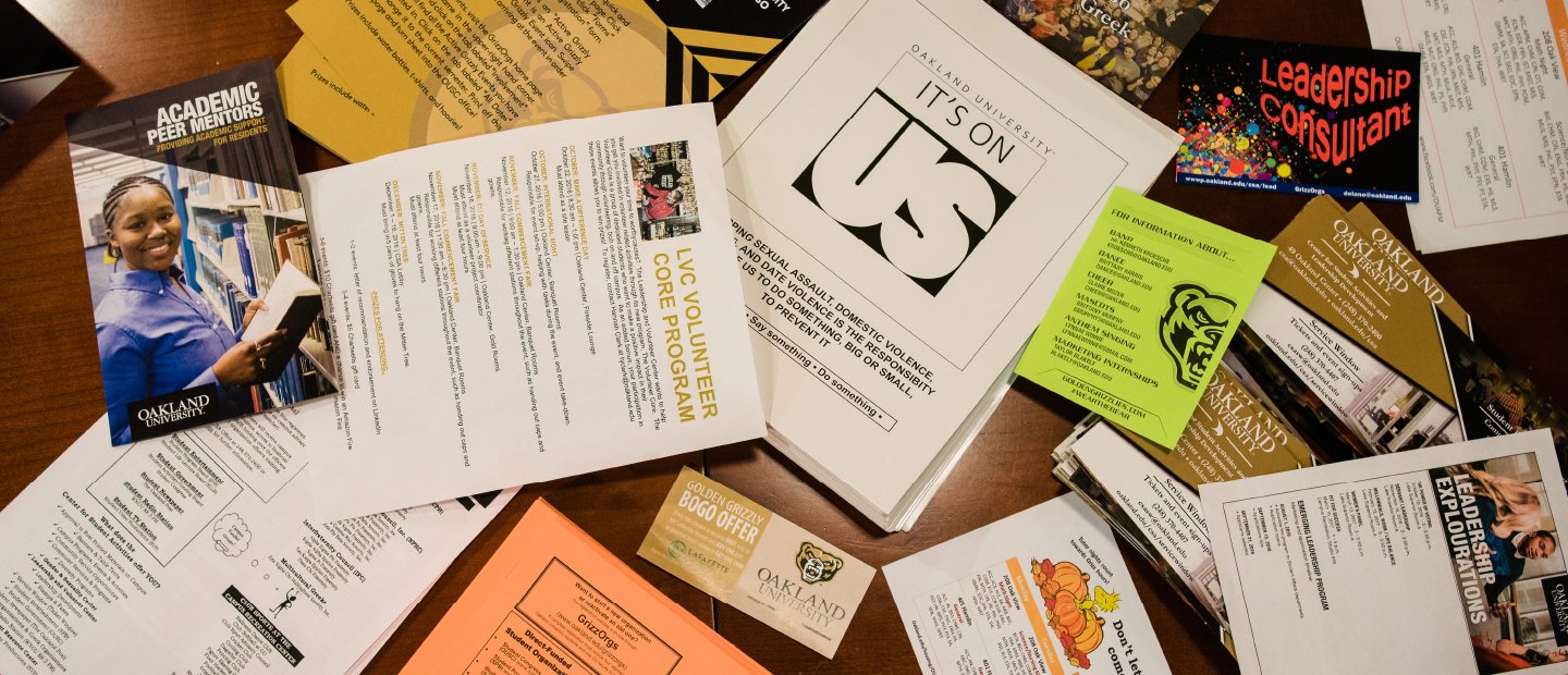 Services and Forms Table covered in a variety of forms and flyers