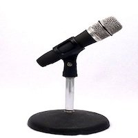 A short tabletop microphone stand.