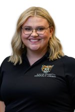 A professional headshot of Hannah Stanhope in a black Oakland University shirt.