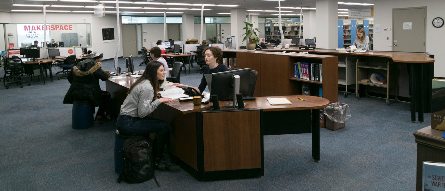 students seated at desks inside Kresge Library