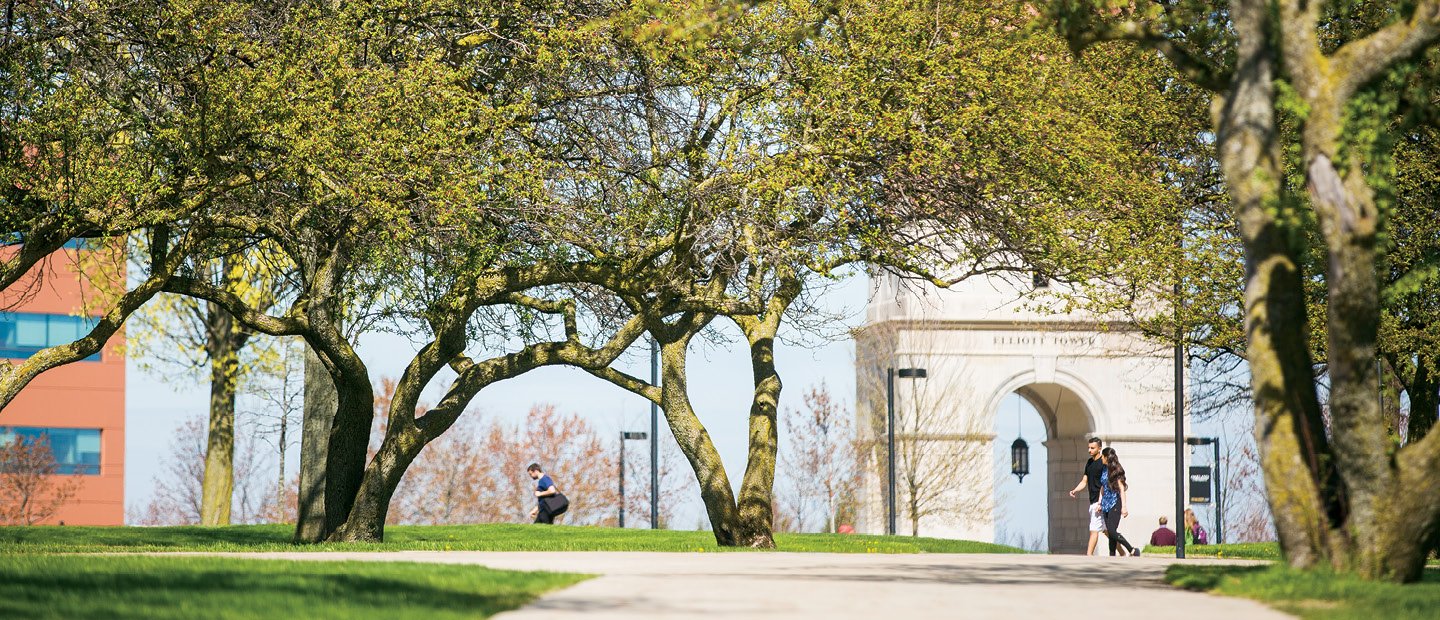 Faculty and Staff Subdivision O U campus in summer with Elliott Tower in the background
