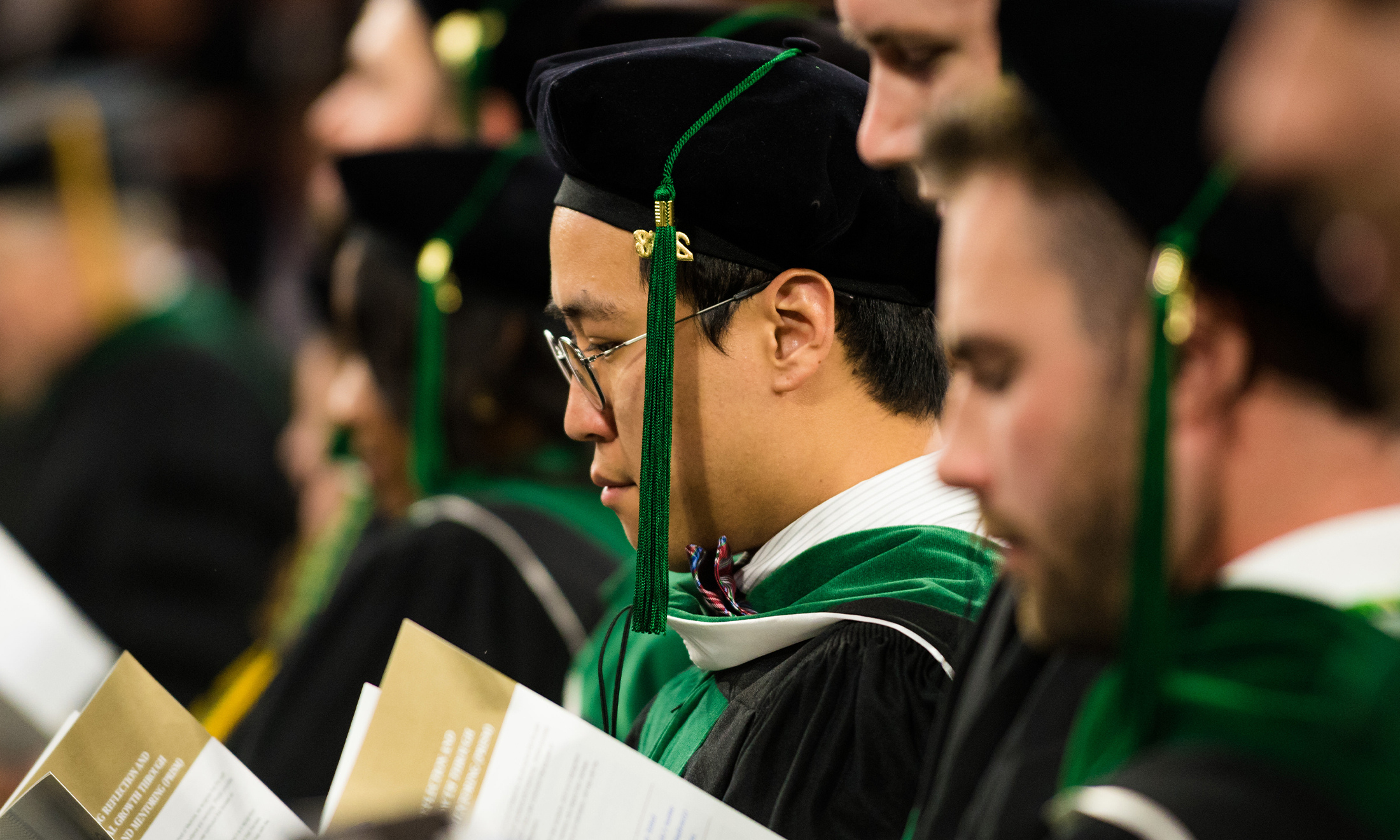 An image of Yujin Oh, M.D., at his commencement ceremony