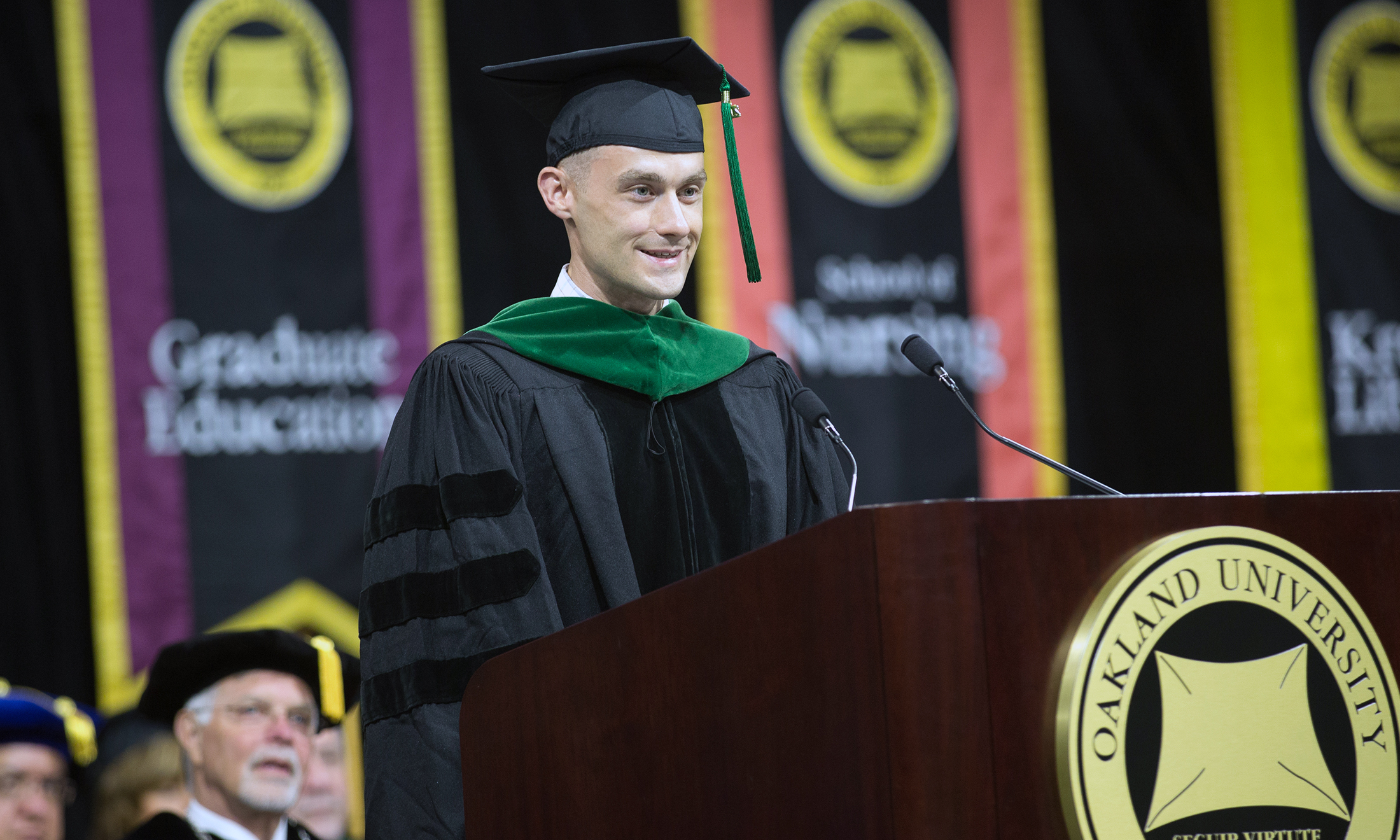 An image of Woody Sams speaking at commencement
