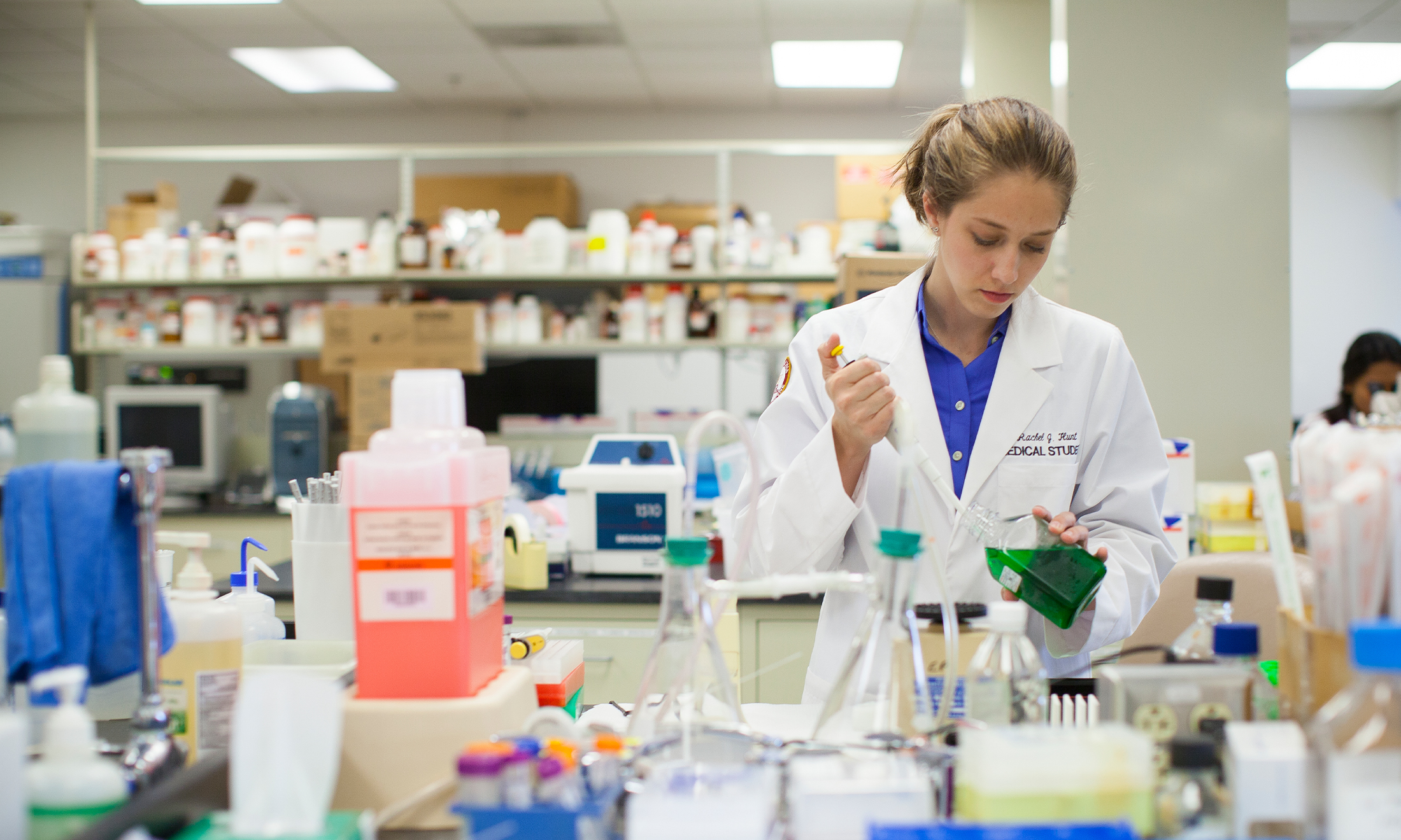 An image of Rachel Hunt, M.D., in the lab