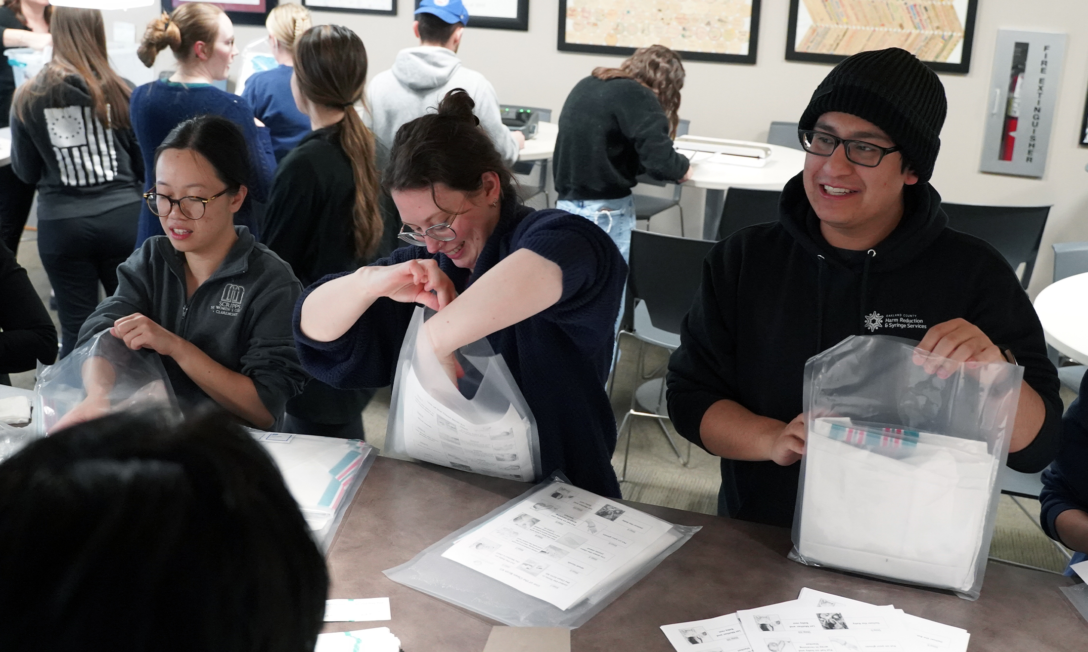 An image of students assembling birthing kits