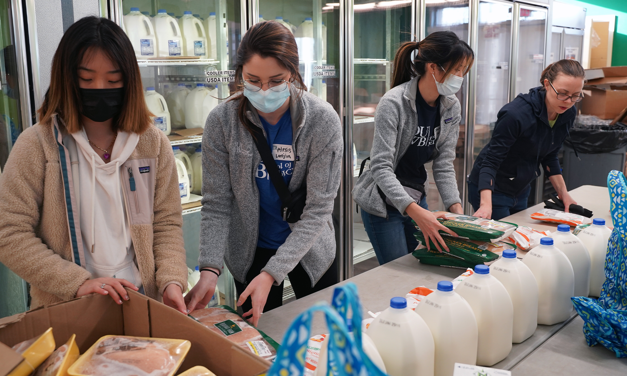 An image of students volunteering at Gleaners