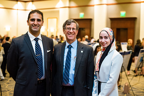 Fred Qafiti, OUWB Founding Dean Robert Folberg, M.D. and Eman Sahloul at the Embark Capstone Colloquium