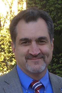 Headshot of Dr. Ramin Homayouni