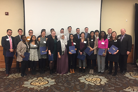 Group photo of inductees into the Gold Humanism Honors Society