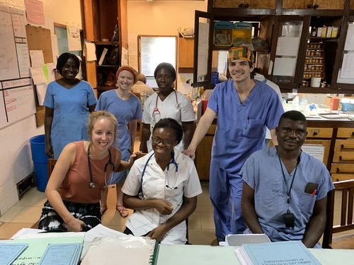 Theresa Timm with staff at west Africa hospital.