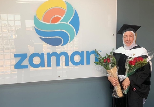 Najah Bazzy after receiving an honorary degree from Oakland University. An image of Najah Bazzy after receiving an honorary degree from Oakland University.