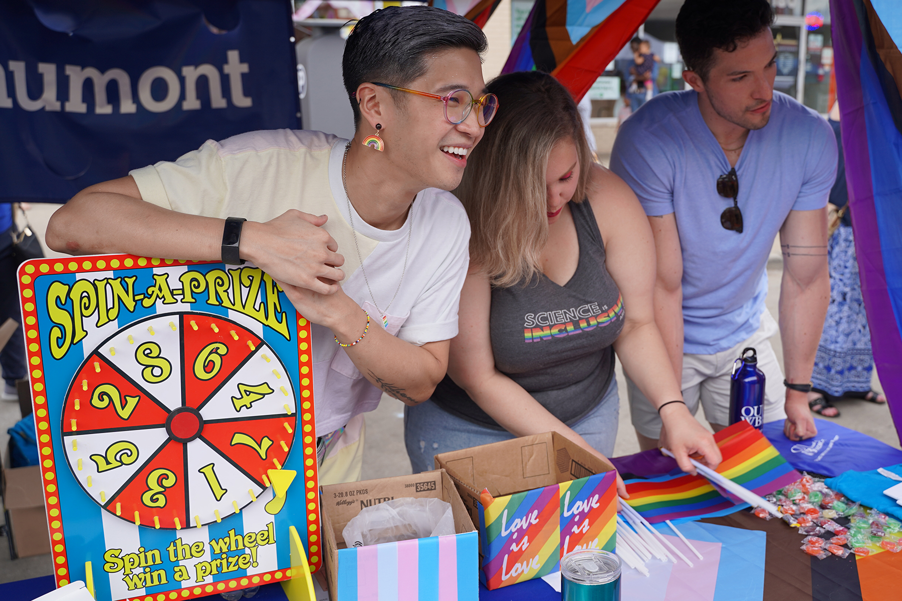 An OUWB student talks with attendees of Pride 22 in Ferndale.