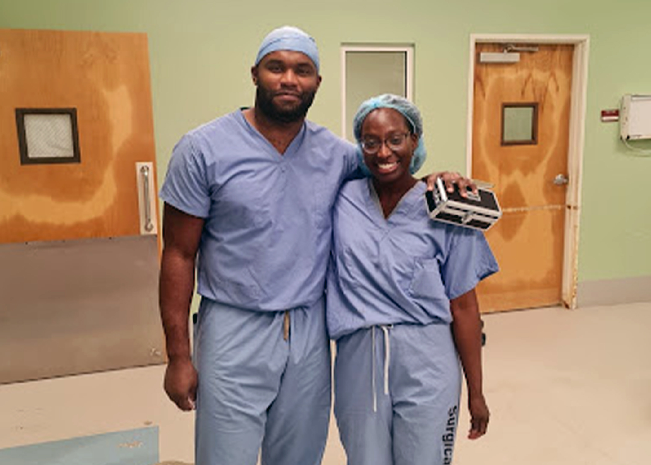 An image of Myron Rolle and Ashley Williams