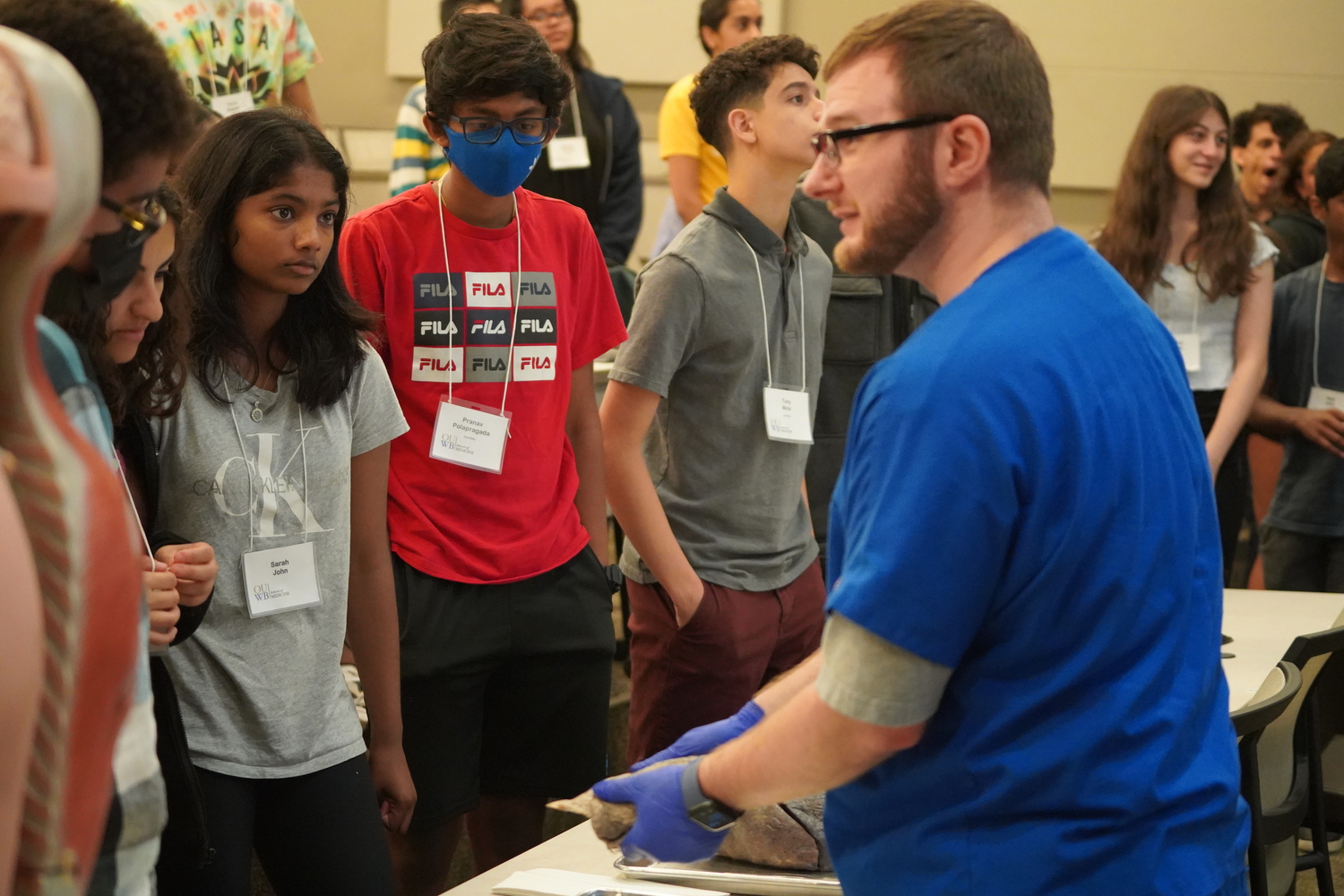 An image of high school students looking at a human lung