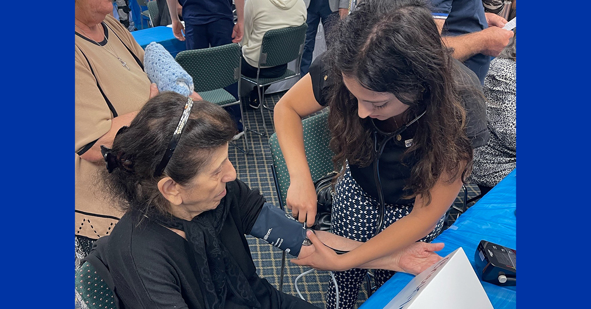 An image of students at a local health fair