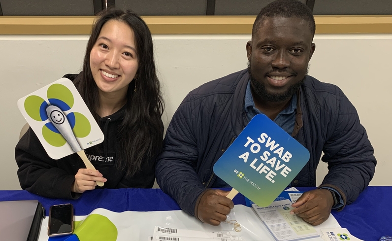 An image of two student volunteers at the Be the Match event