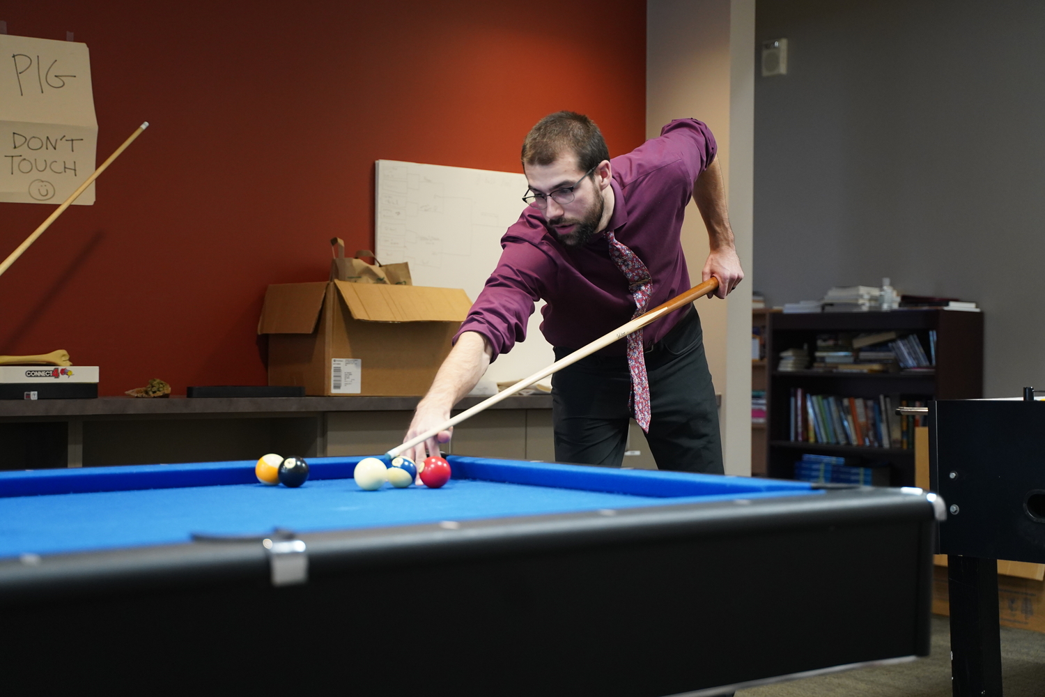 An image of an OUWB student playing pool