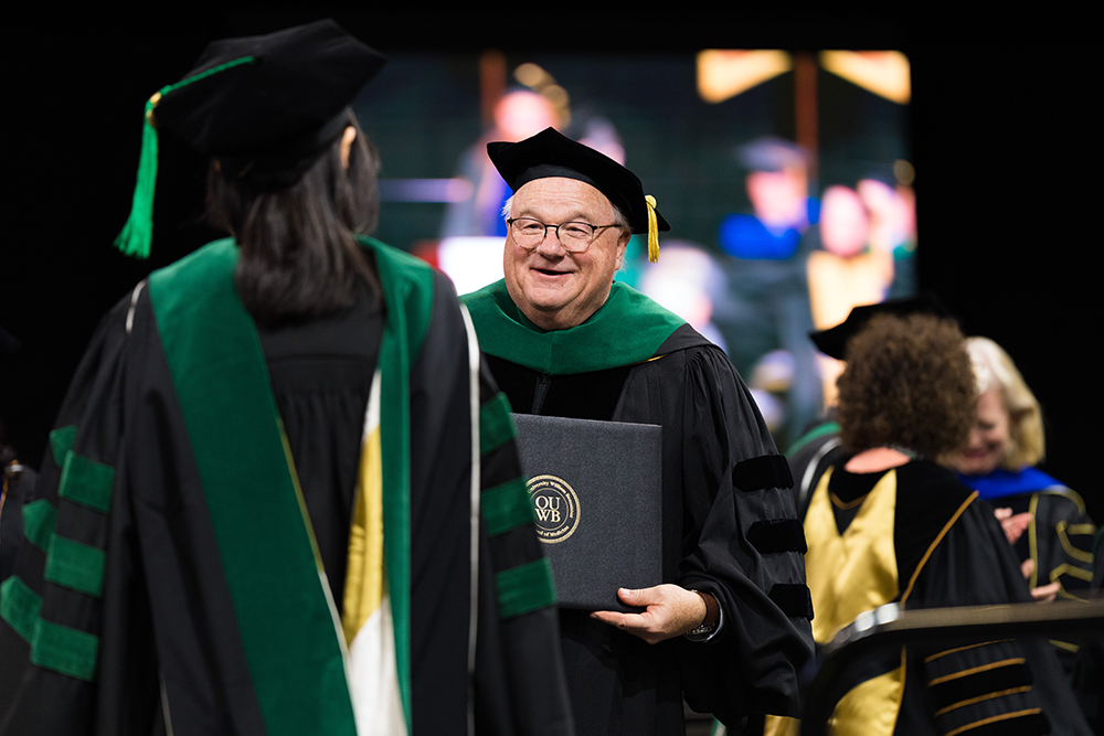 An image of Dr. Mezwa at OUWB Commencement