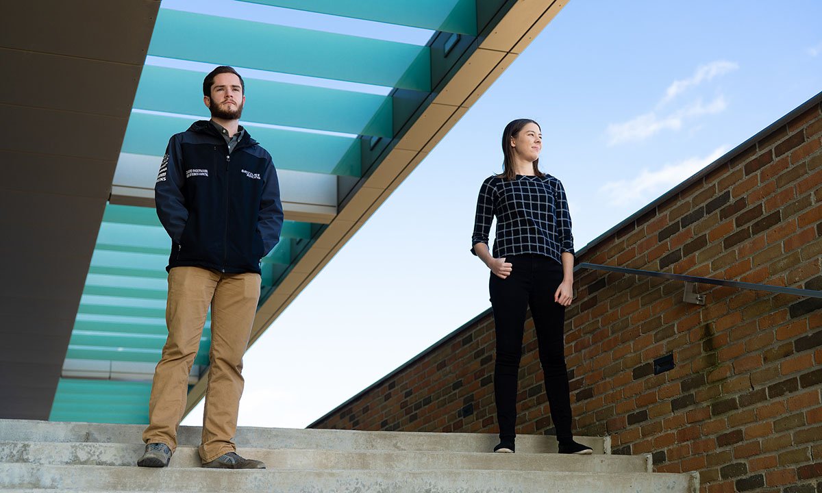 Two students standing outside Engineering Building