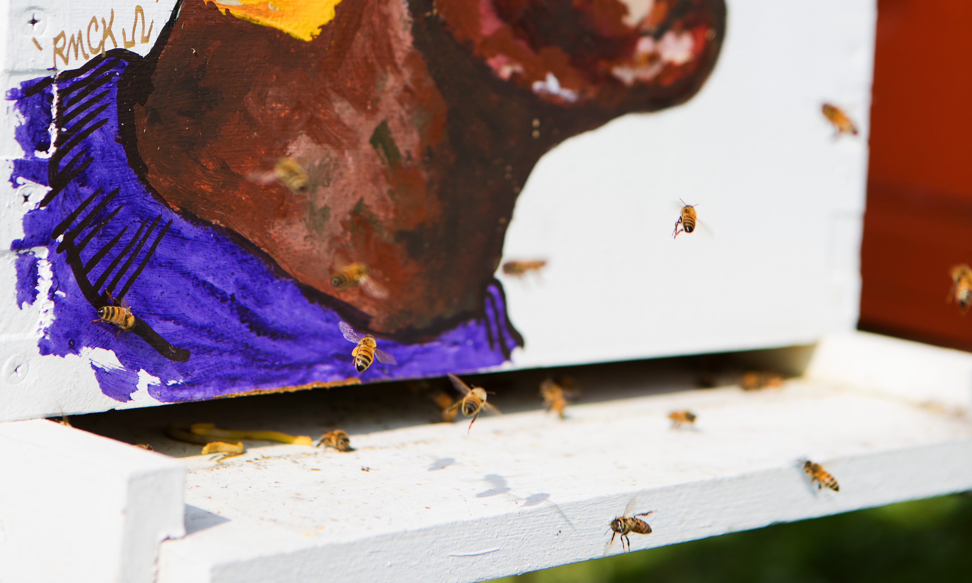 A painting of a man on a beehive