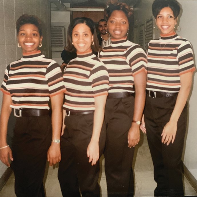 Four women in striped shirts; 1996