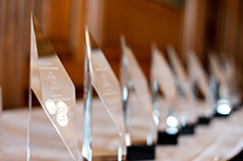 image of a row of trophies on a table