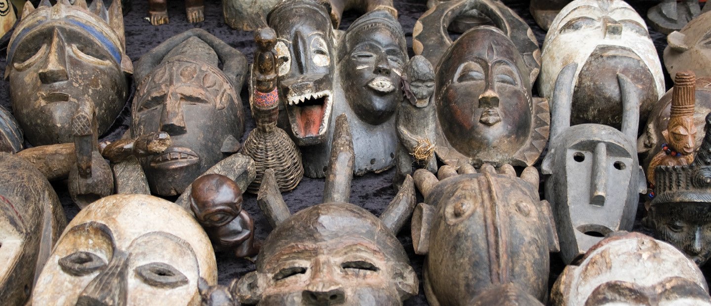 A collection of old mask artifacts.