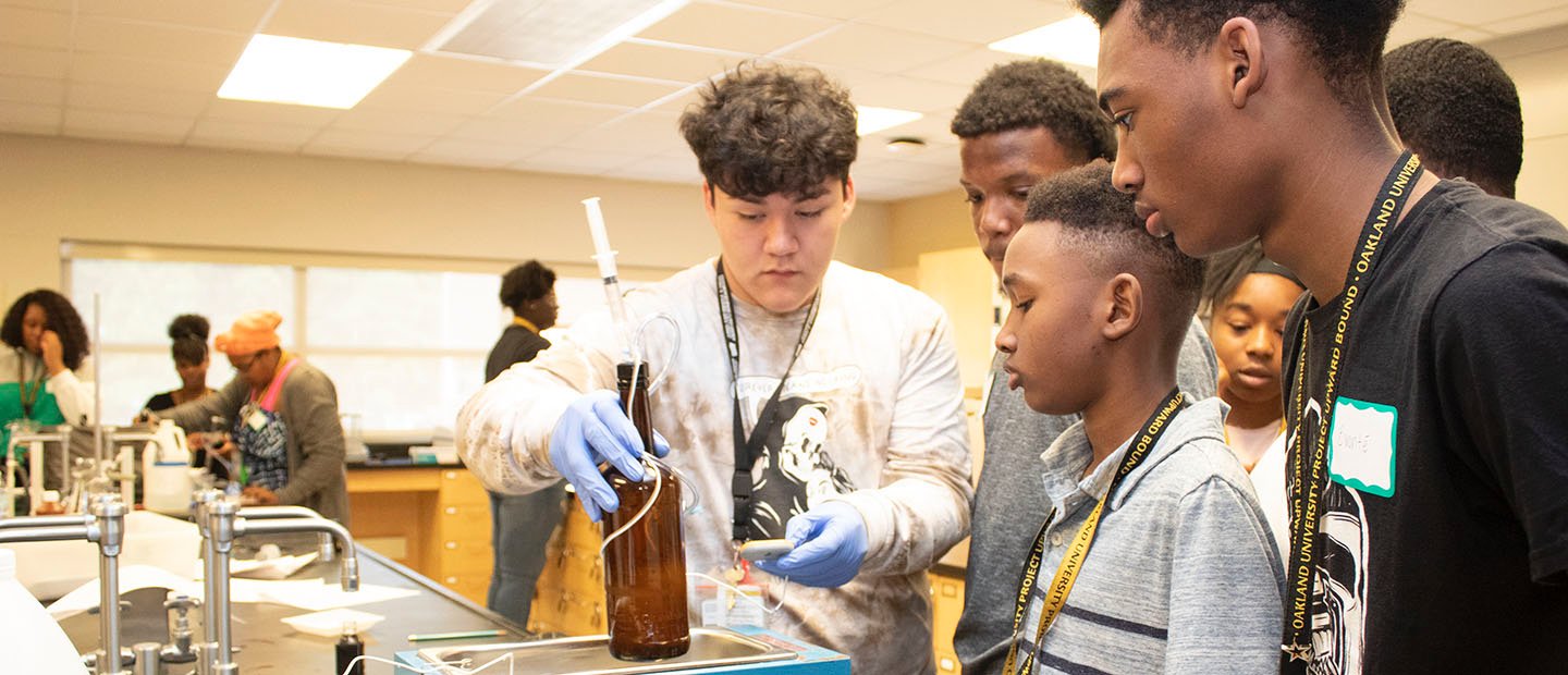 A group of students working on a science project in a lab.