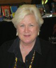 A headshot of Barbara B Hamilton.