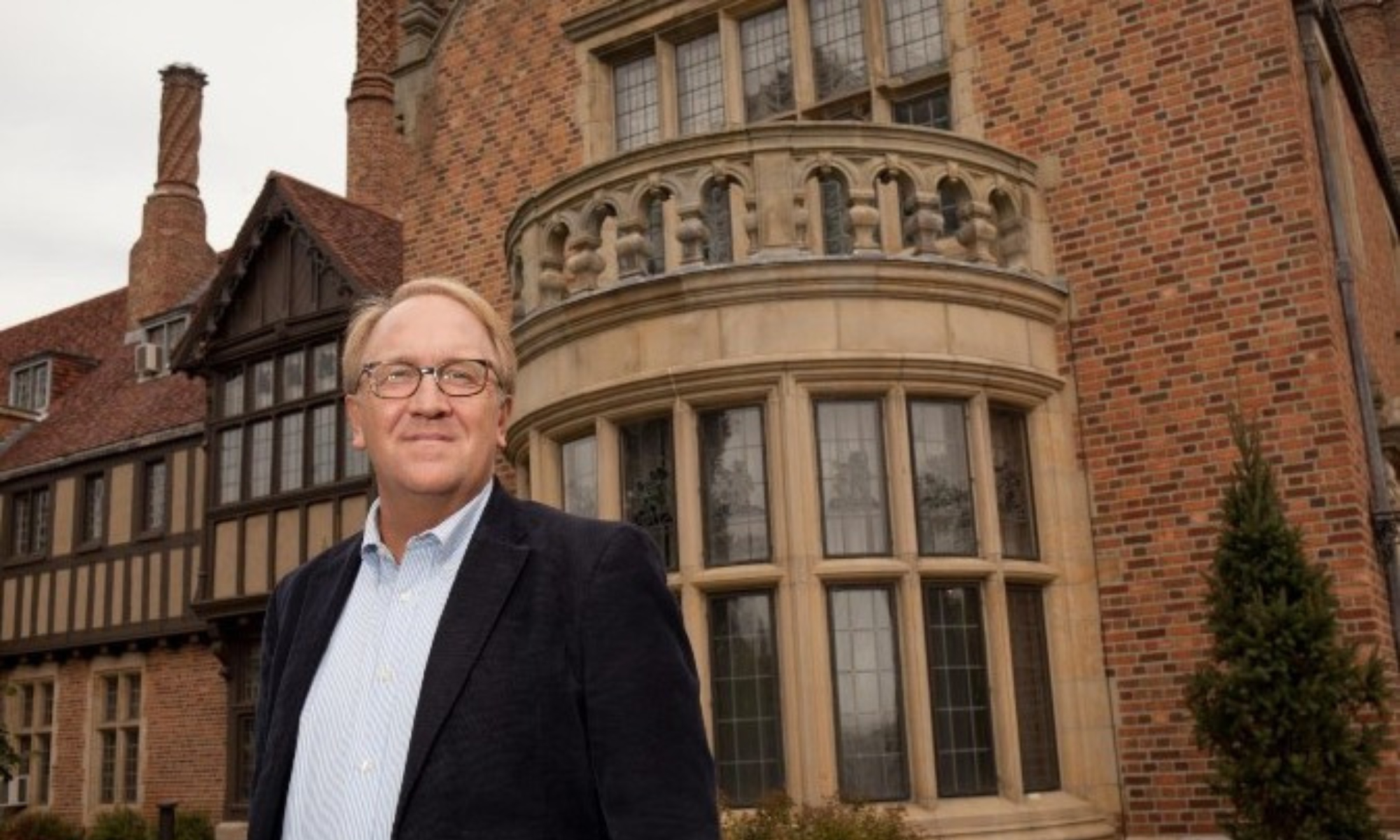 Man standing outside Meadow Brook Hall