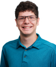 A headshot of Business Honors student, Ethan.