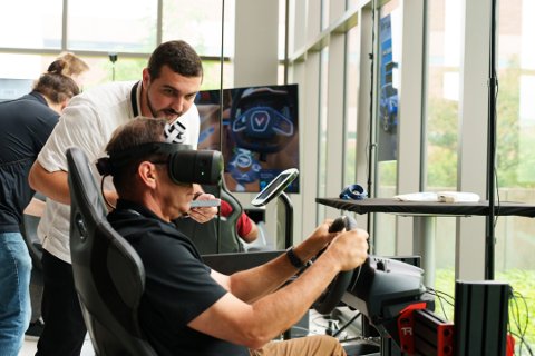 People in OU's Augmented Reality Center using AR equipment