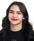 Maria Alvares smiling at the camera