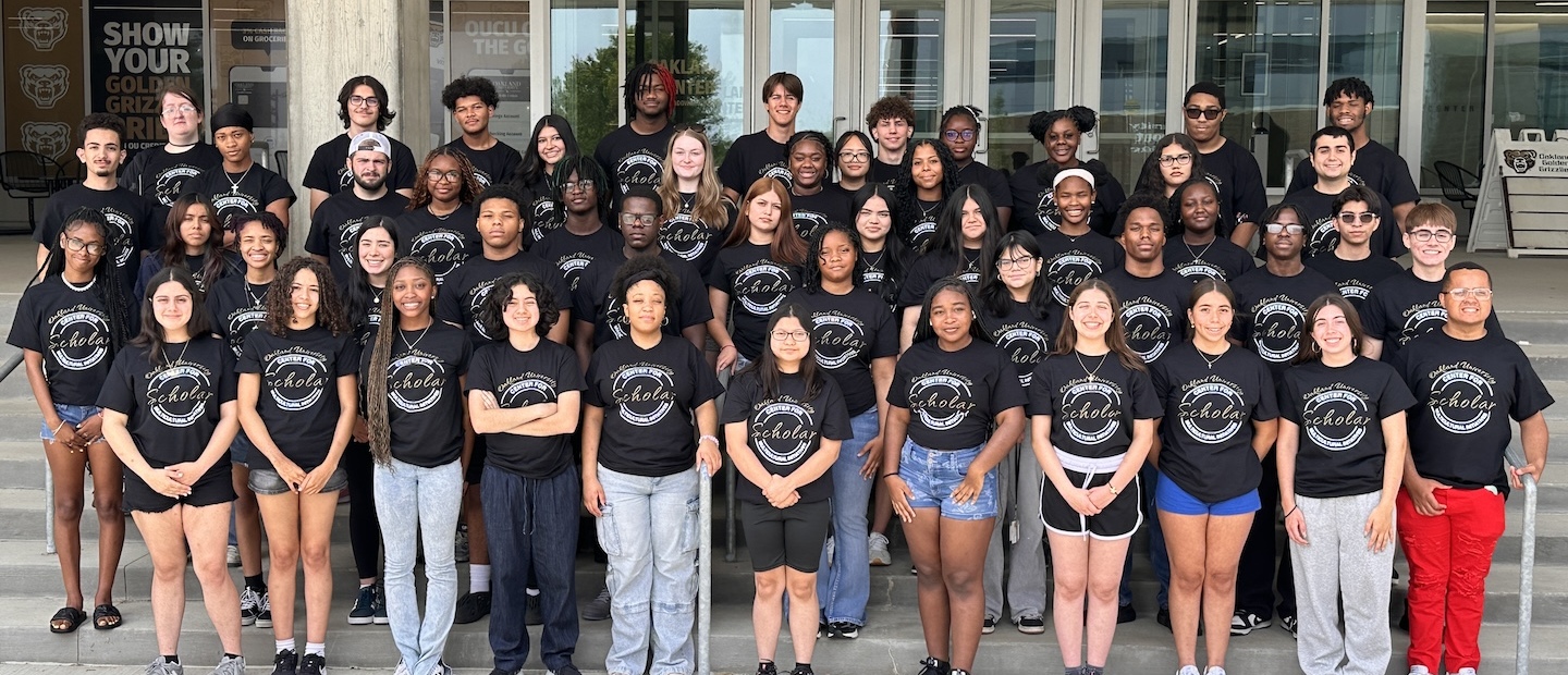 Group of students smiling into camera
