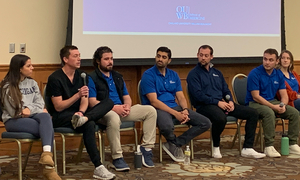 OUWB students on a stage