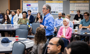 Dr. Mitton speaks during the retreat