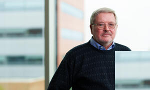 Dick Amacher poses for a picture