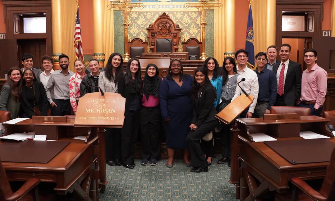 An image of OUWB students in the chambers of the Michigan House of Representatives