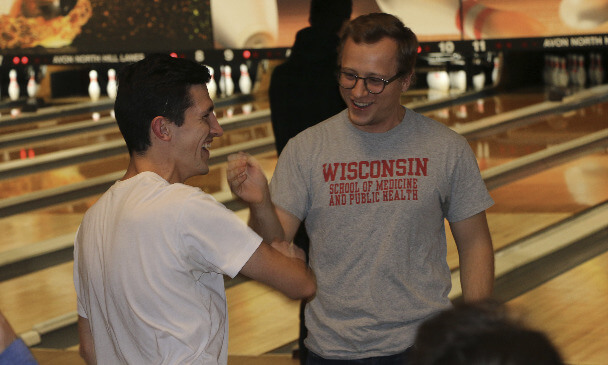 An image of OUWB students bowling and celebrating