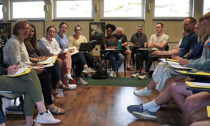 An image of OUWB medical students during a reflective writing session in Poland