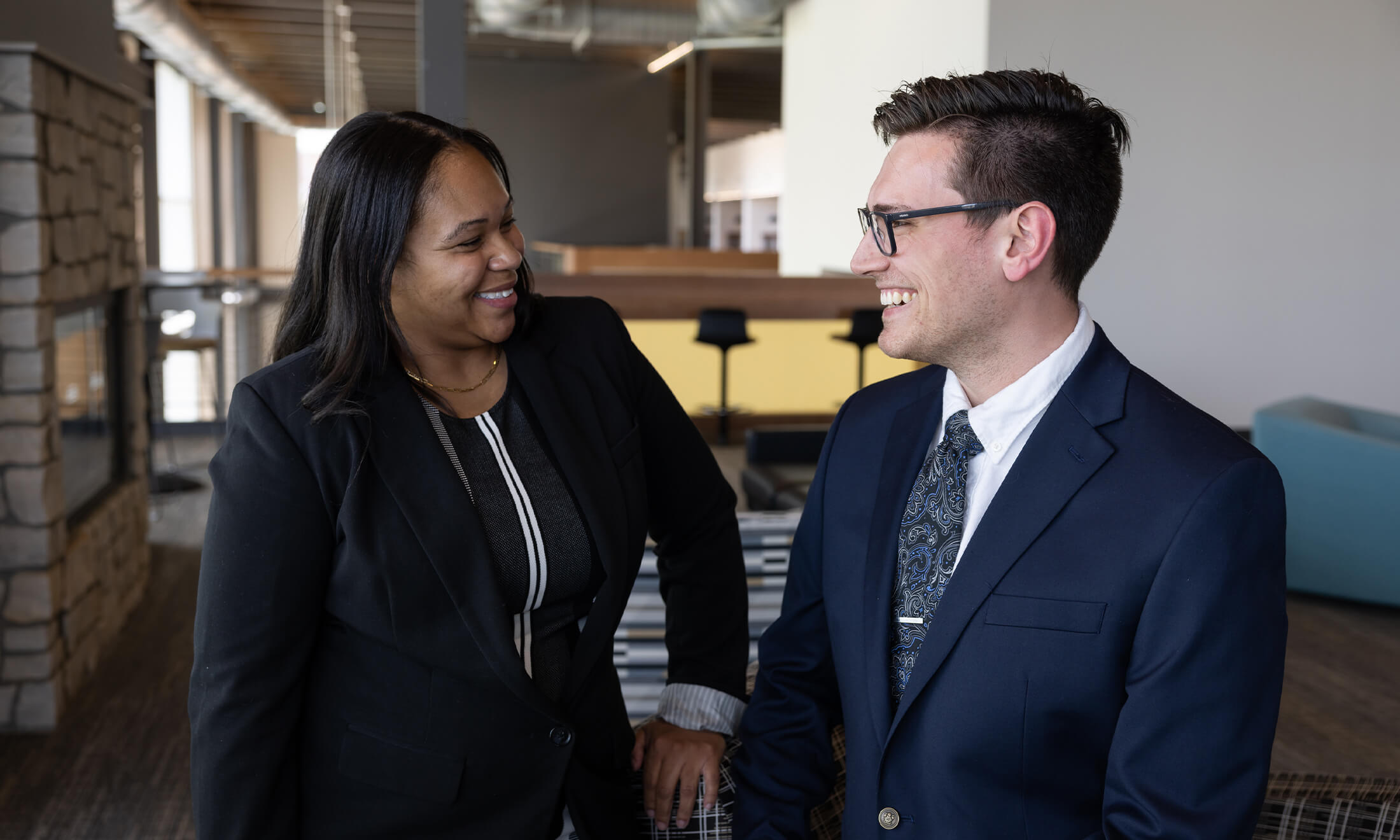 Tiffany Williams and Eric James talking to each other