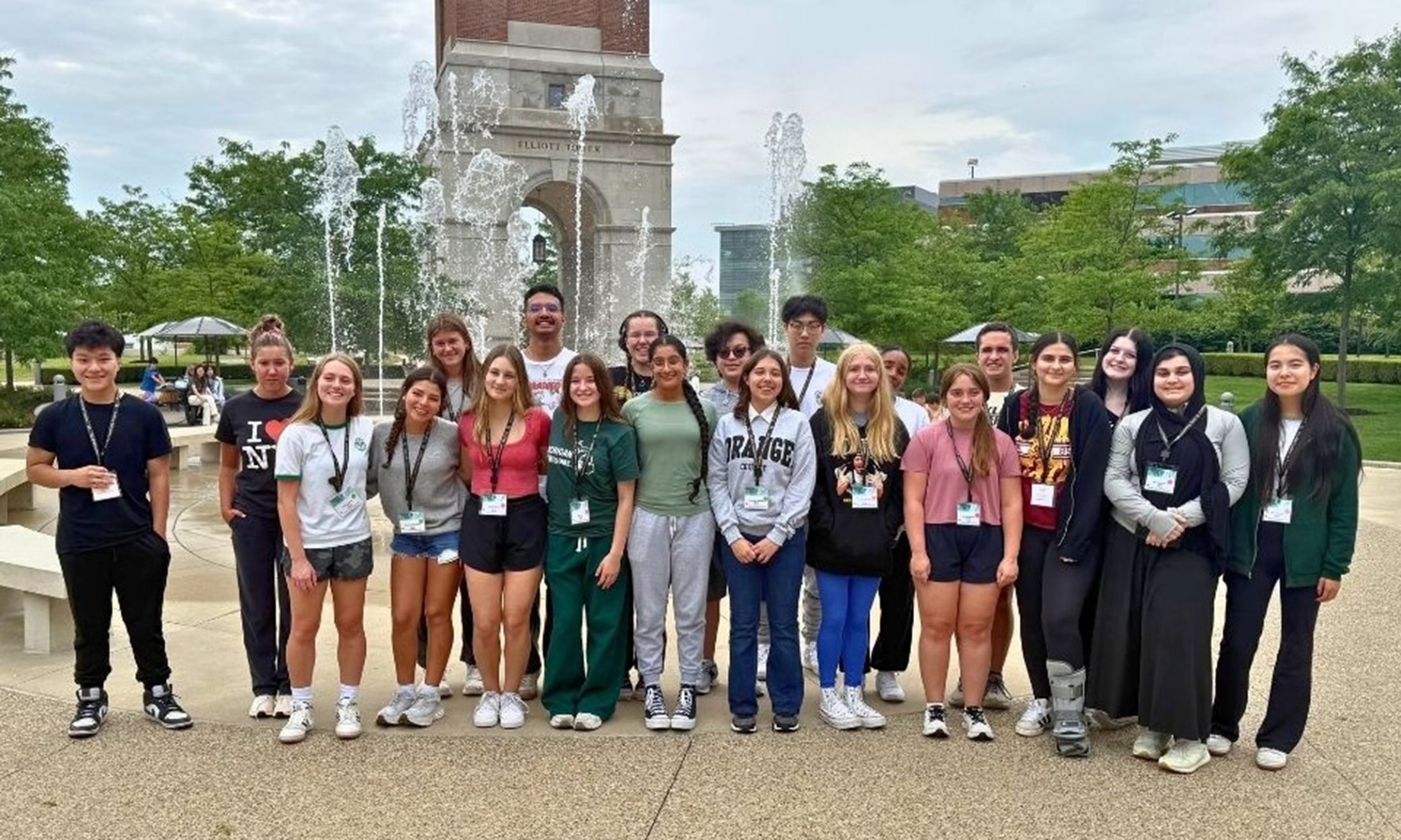 A group of students in front of Elliott Tower and the fountains