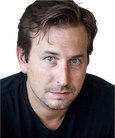 Gregory Thrasher looking at the camera