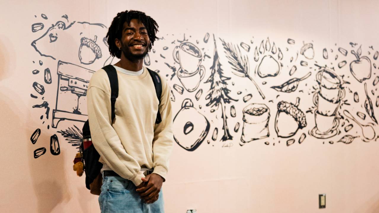 Graphic design student Kadin Price illustrated the graphics and helped create the visual identity for Oso Café.
