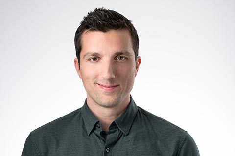 A headshot of Chris Powers