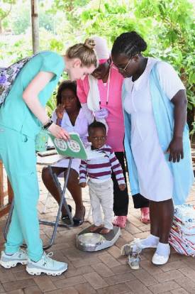 Students working with patients at clinic